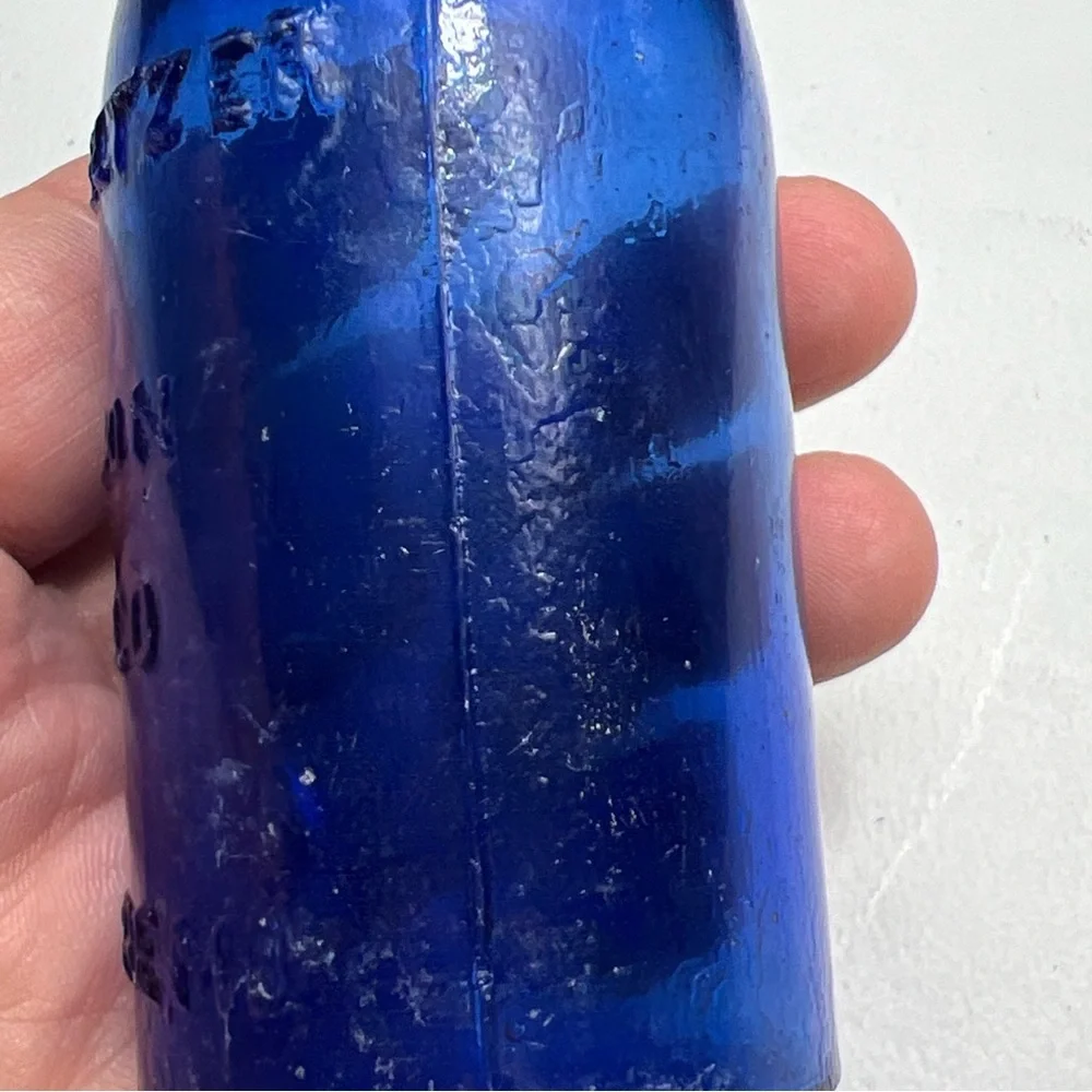 Lot of 4 vintage Colbalt Blue Glass Bottles